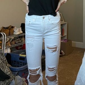Destroyed white skinny jeans